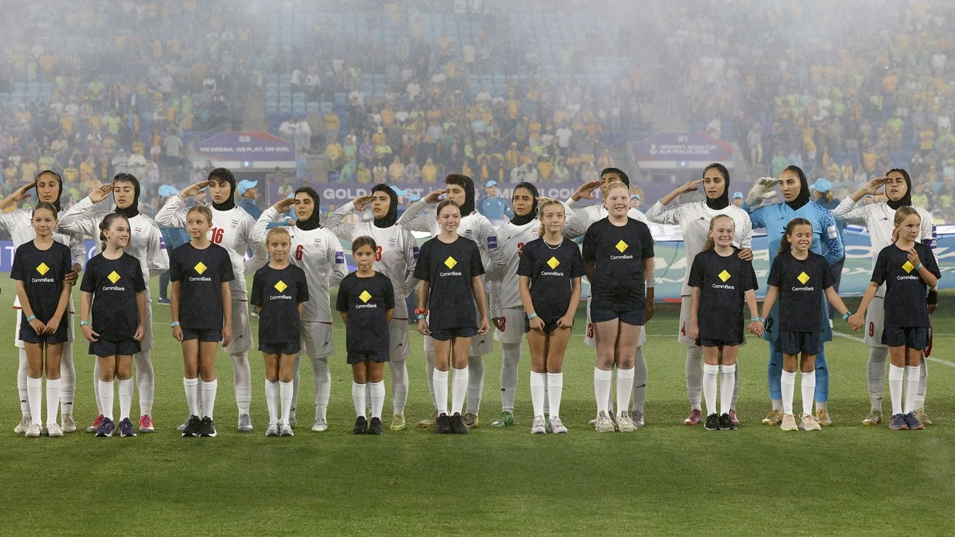iran-players-salute-and-sing-national-anthem-at-womens-asian-cup-match